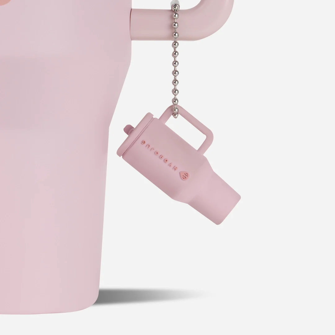 traveler-keychain-r1 Web-TravelerKeychainPhotos-PinkSand2.webp